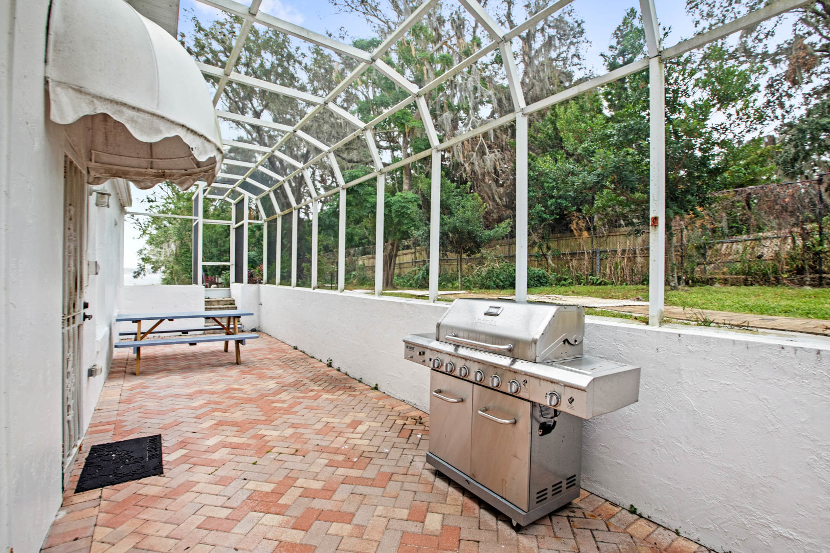 enclosed patio with brick